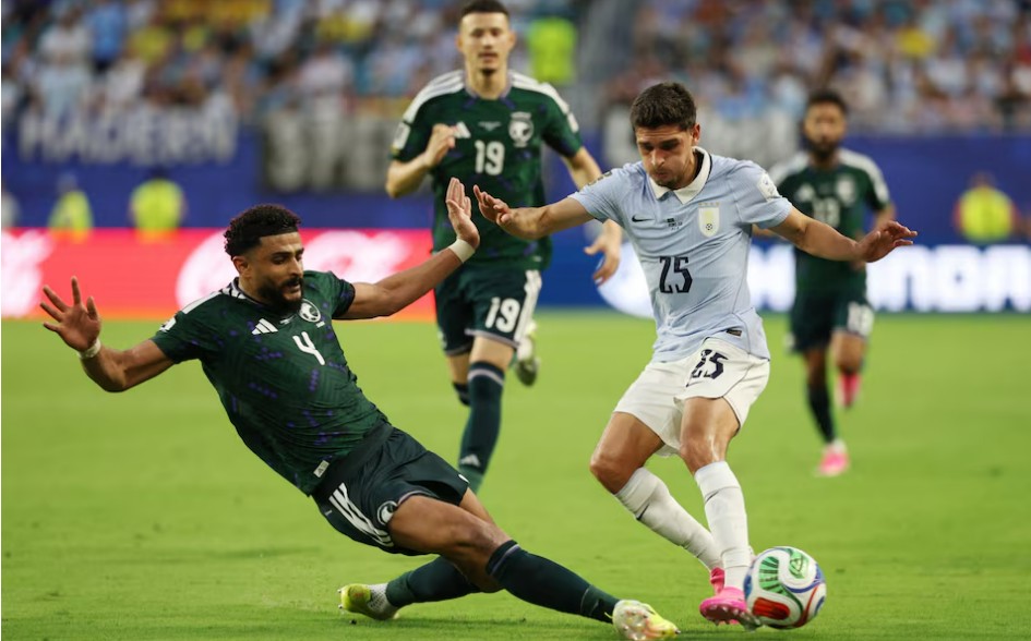 URUGUAY AND SAUDI ARABIA TRIPLE-X IN BLUNDER-FILLED GROUP H OPENER